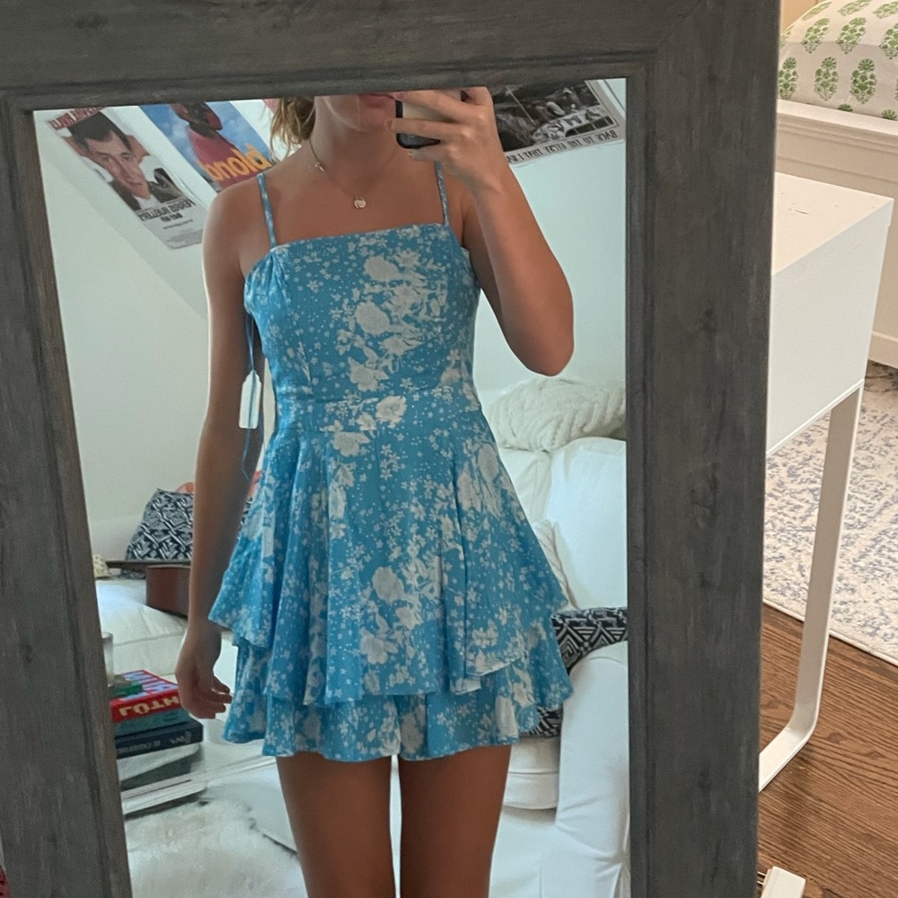 Love Lola floral romper. Brand new